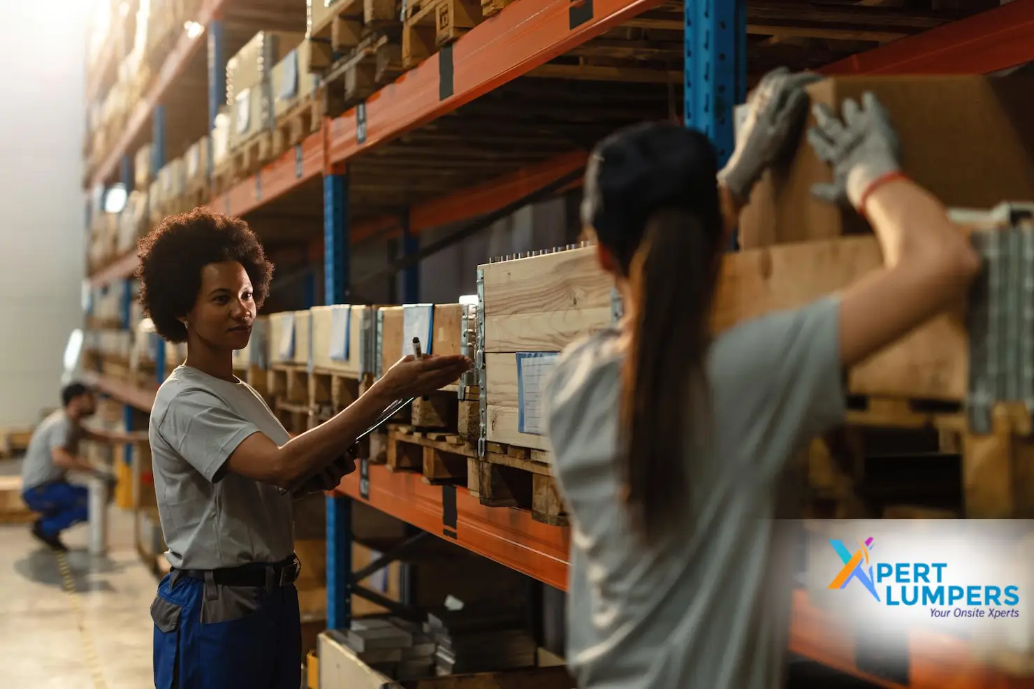 Xpert Lumpers Services Limited Blogs - A high-angle shot of a clean, organized Canadian warehouse dock with perfectly stacked, color-coded pallets and a professional sorting team in safety gear.