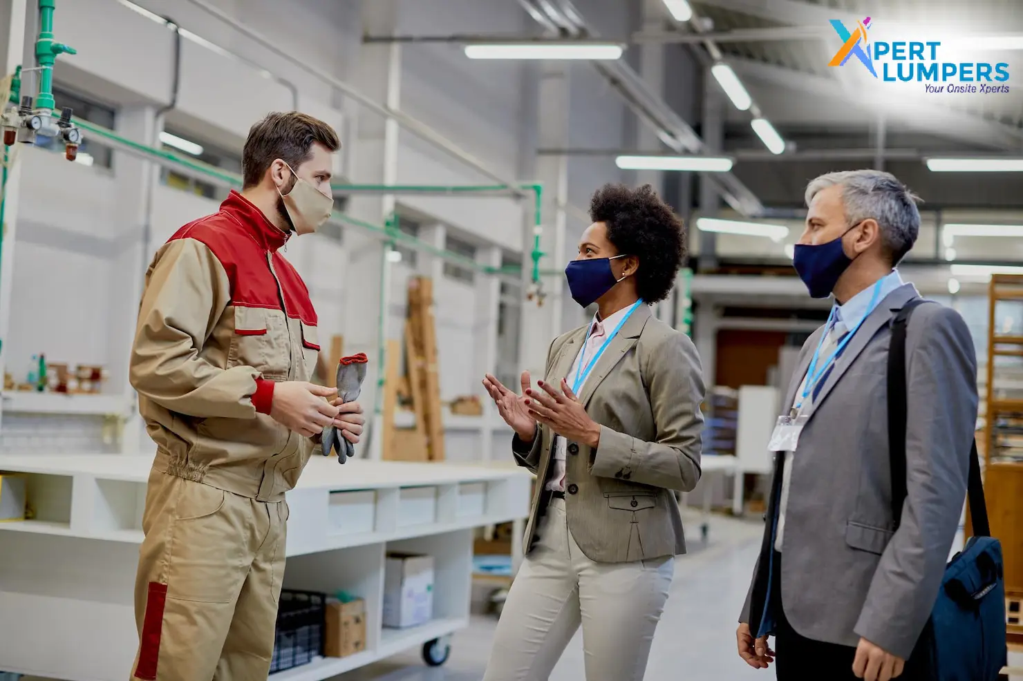 Xpert Lumpers Services Limited Blogs - A team of specialized logistics experts in Xpert Lumpers branded high-visibility vests accurately labeling and repacking freight inside a modern distribution center.